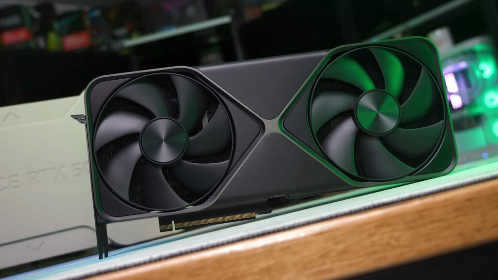 Nvidia RTX 5090 and 5070 Ti graphics cards placed on a gaming desk.