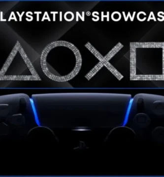 PlayStation controller on a desk with a blurred background of game posters, symbolizing Sony gaming events.