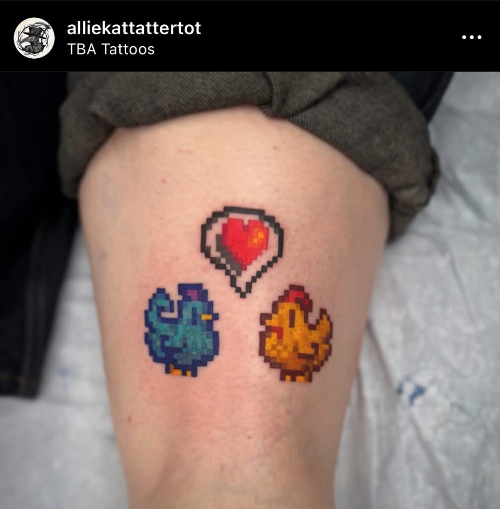 Stardew Valley chicken tattoo featuring pixel art Golden and Blue chickens with heart above them