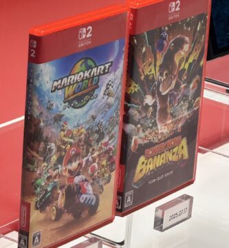 Nintendo Switch 2 game cases with new spine design compared to original red-spined cases.
