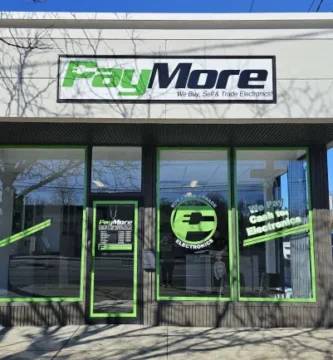 PayMore storefront opening in a former GameStop location with new signage and interior upgrades