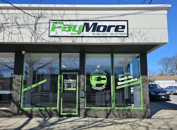 PayMore storefront opening in a former GameStop location with new signage and interior upgrades