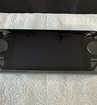 Steam Deck prototype with round touchpads and colored buttons