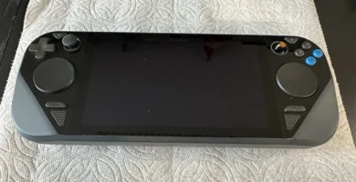 Steam Deck prototype with round touchpads and colored buttons