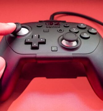Nintendo Switch 2 Pro Controller with fast charging indicator beside original controller