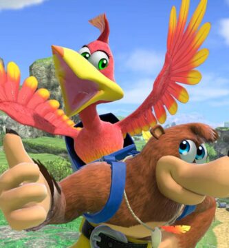 Grant Kirkhope speaking at a video game panel with Banjo-Kazooie artwork in the background