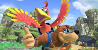 Grant Kirkhope speaking at a video game panel with Banjo-Kazooie artwork in the background