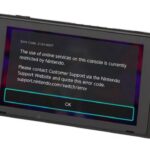 Warning screen on Nintendo Switch alerting users about unauthorized modifications or piracy