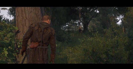 Henry sneaking through a forest in Kingdom Come Deliverance 2 Brushes with Death DLC trailer