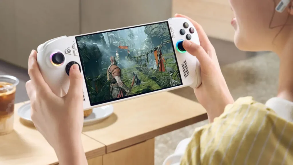 ROG Xbox Ally handheld console displaying God of War gameplay on screen