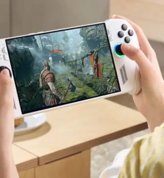 ROG Xbox Ally handheld console displaying God of War gameplay on screen
