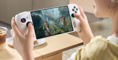 ROG Xbox Ally handheld console displaying God of War gameplay on screen