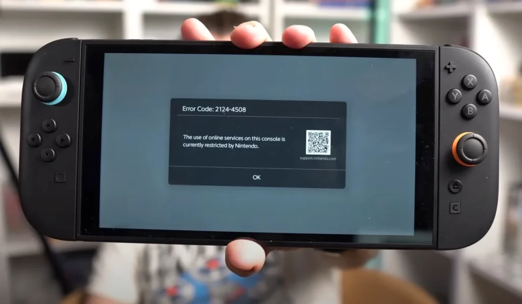 Nintendo Switch 2 console with banned message on screen