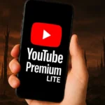 Frustrated user looking at YouTube Premium Lite email warning about upcoming ads