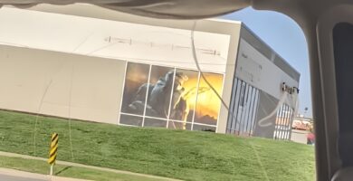 Large Master Chief poster in former GameStop window in Ames, Iowa