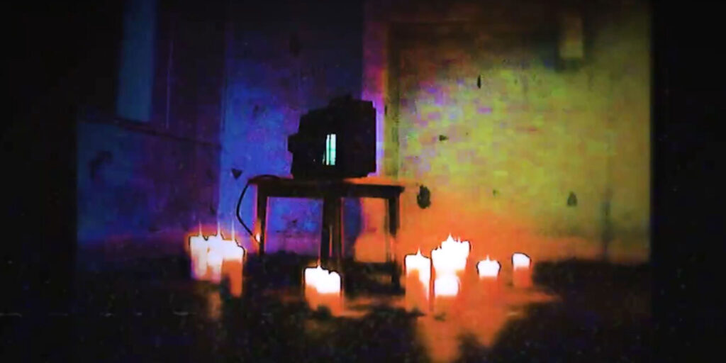 Screenshot of Saber Interactive’s Hellraiser game teaser showing candle-lit device