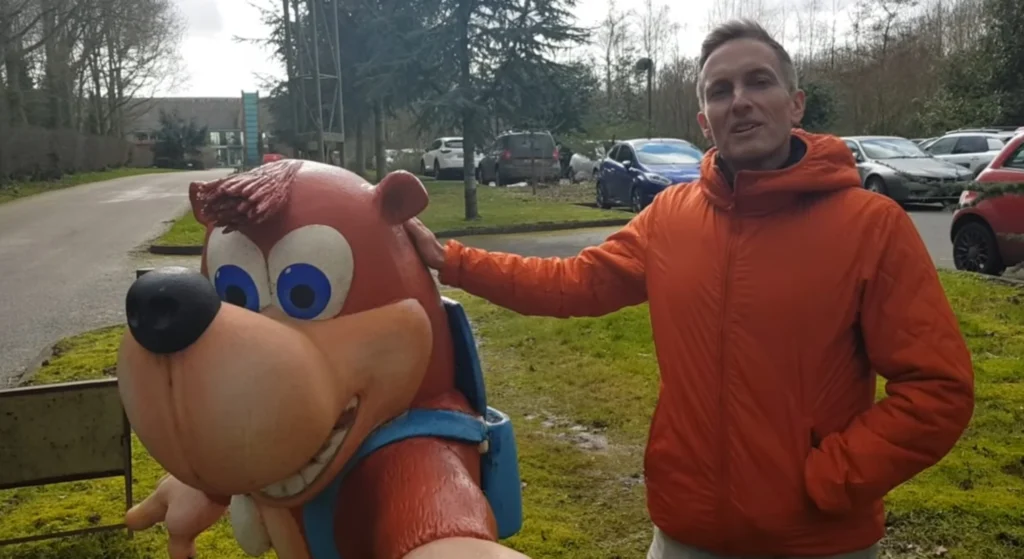 Gregg Mayles with Banjo-Kazooie and Everwild artwork, symbolizing his departure from Rare after 35 years