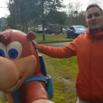 Gregg Mayles with Banjo-Kazooie and Everwild artwork, symbolizing his departure from Rare after 35 years