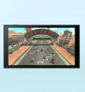 Nintendo Switch 2 console with blurred placeholder sales data in background