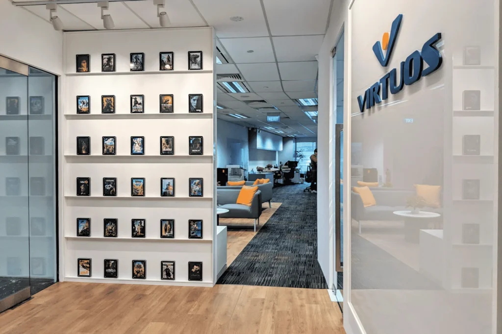 Virtuos game development studio empty desks after reported layoffs in 2025