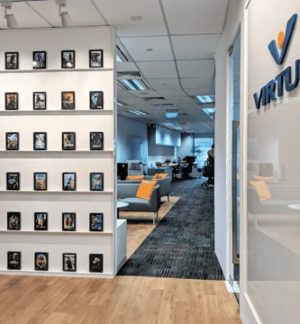 Virtuos game development studio empty desks after reported layoffs in 2025