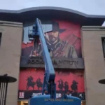 Rockstar Games headquarters with GTA 6 and Red Dead Redemption imagery hinting at multiple projects in development.