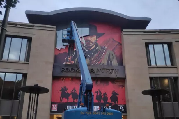 Rockstar Games headquarters with GTA 6 and Red Dead Redemption imagery hinting at multiple projects in development.