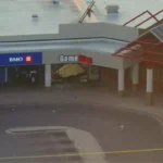 Damaged GameStop storefront after smash-and-grab robbery in Chicago