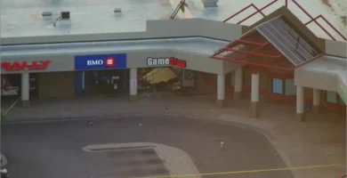 Damaged GameStop storefront after smash-and-grab robbery in Chicago