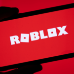 Roblox logo with child safety alert and age restriction update